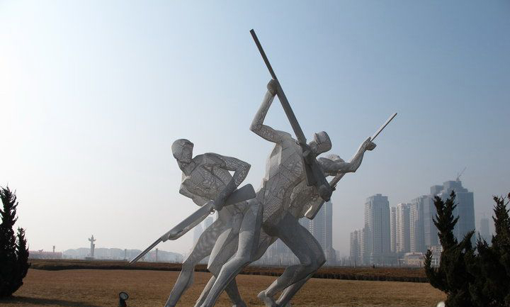 不锈钢射击运动人物雕塑图片