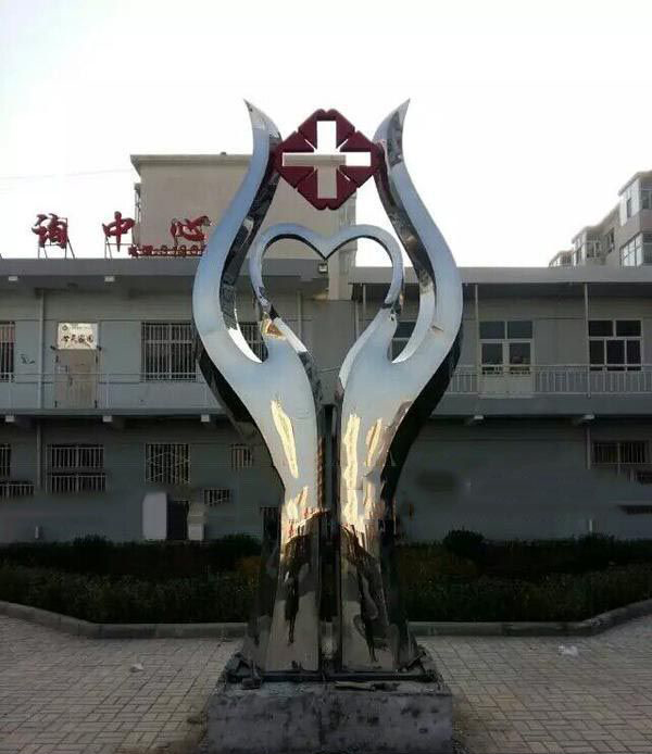 医院不锈钢医者仁心景观雕塑图片