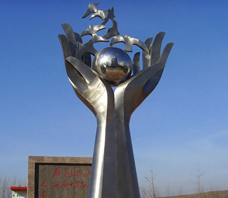 公园不锈钢手托球景观雕塑图片