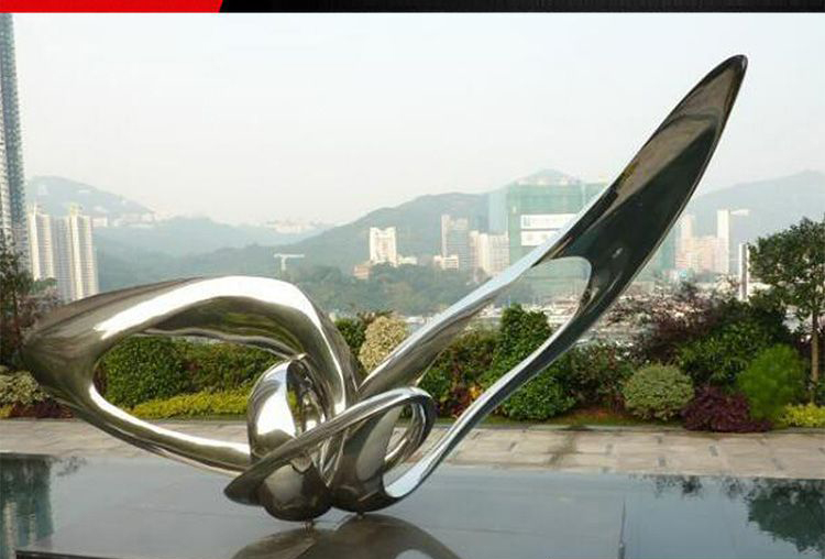 花园不锈钢飞翔景观雕塑图片