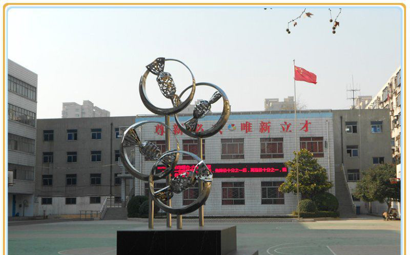 校园不锈钢镂空糖果雕塑图片