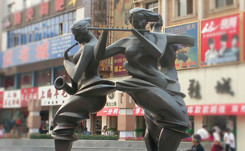 不锈钢吹笛子人物广场雕塑图片