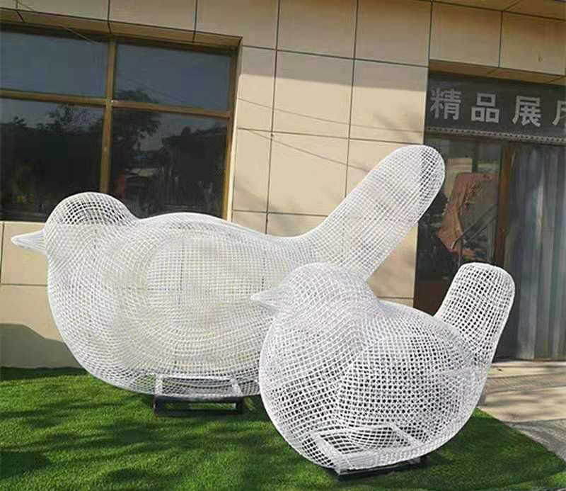 不锈钢镂空鸟雕塑图片