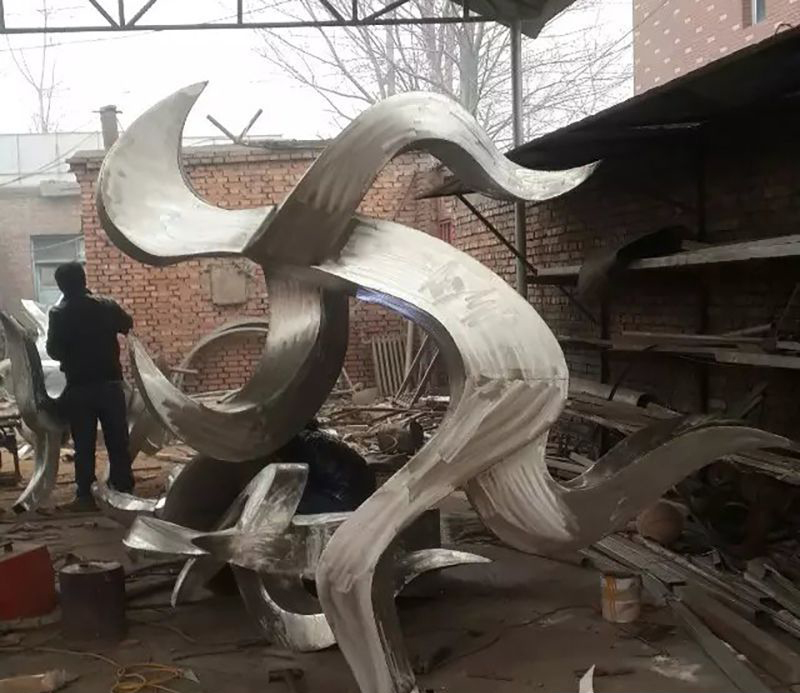 不锈钢跑步抽象人物图片