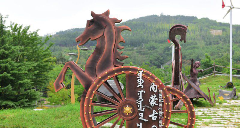 抽象马车不锈钢标志雕塑图片