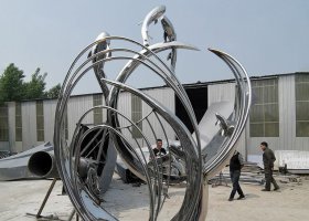 不锈钢抽象鲤鱼跃龙门雕塑 