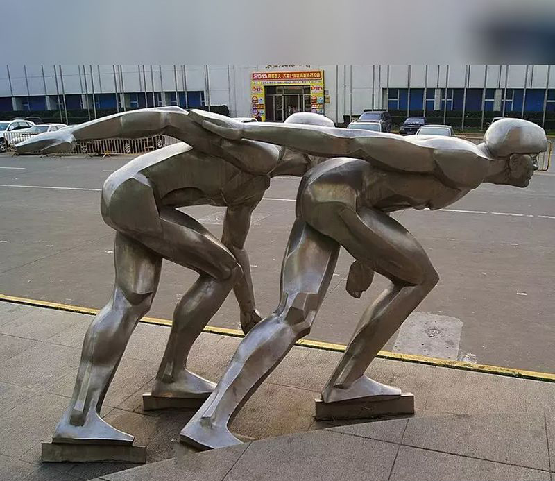 不锈钢滑冰人物雕塑图片