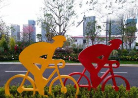 城市不锈钢骑单车人物雕塑