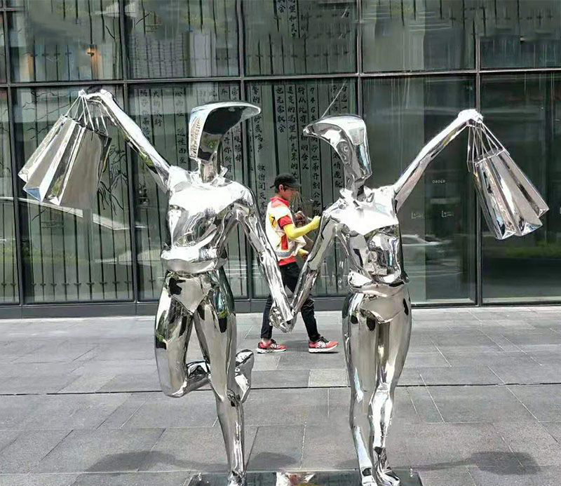 不锈钢购物雕塑图片