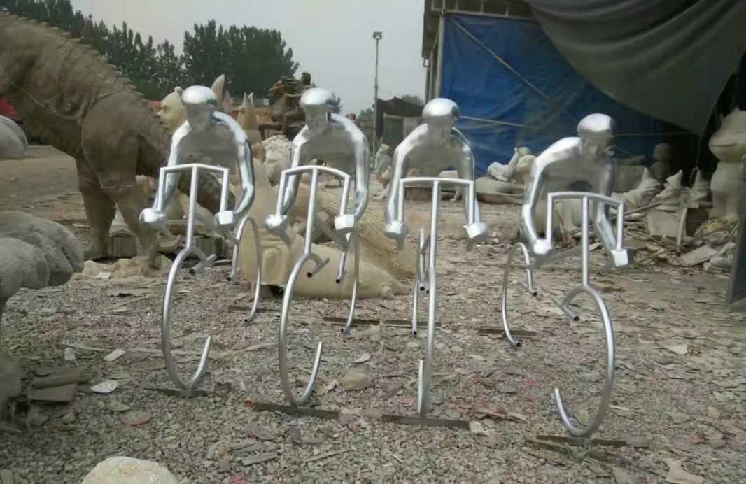 不锈钢广场抽象骑自行车人物雕塑图片