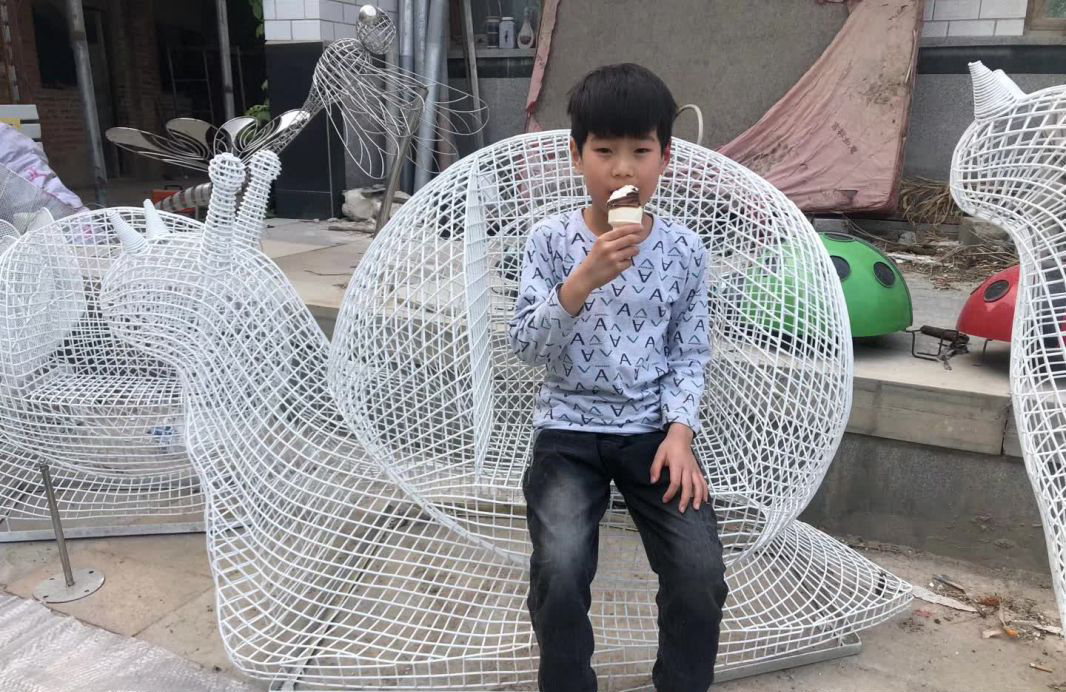 不锈钢艺术蜗牛座椅图片